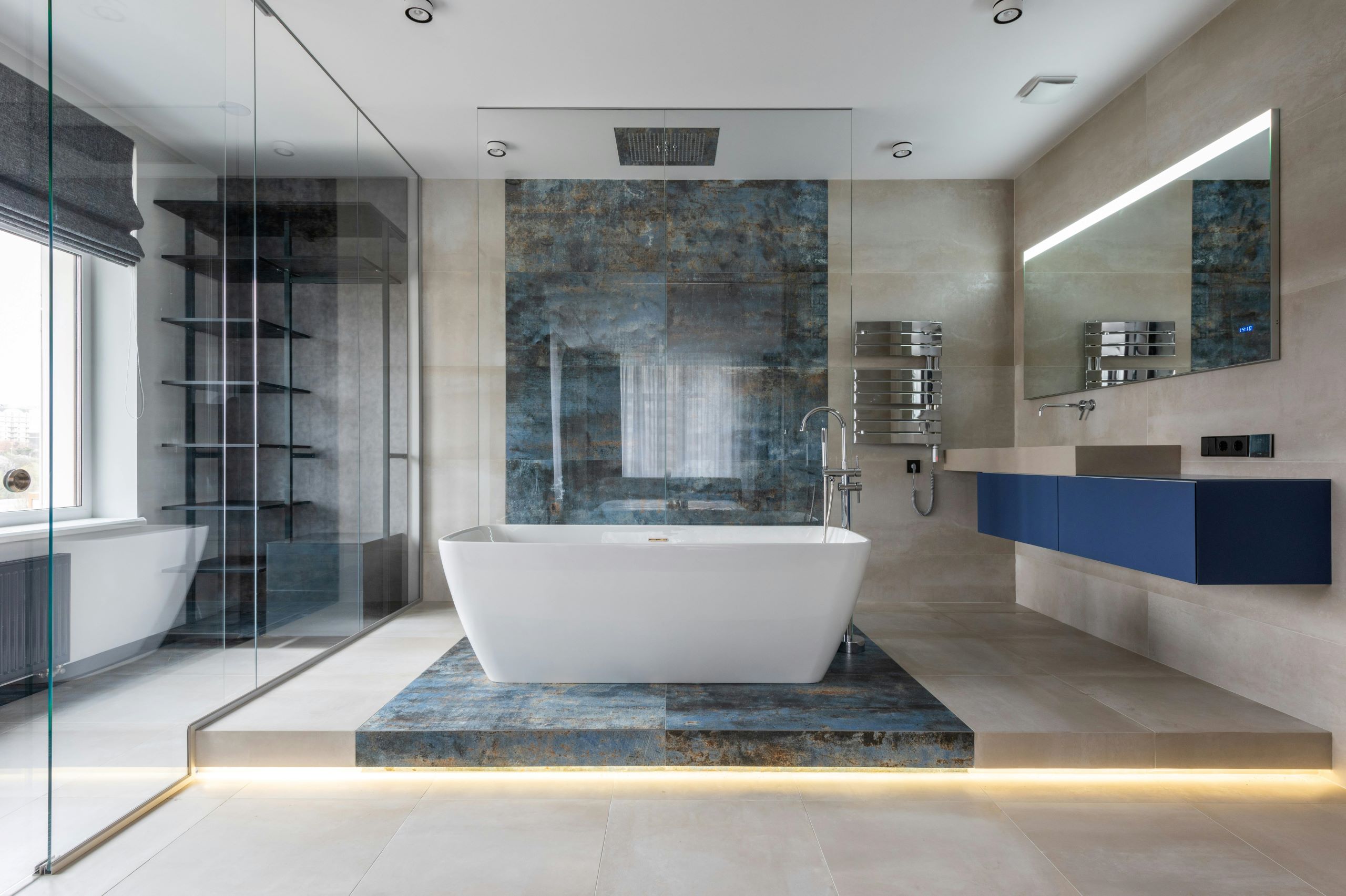 Modern and contemporary bathroom with soaker bathtub, walk-in shower, clean lines, glass and chrome accents