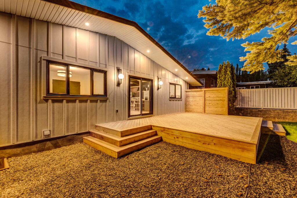 Large backyard deck with privacy wall