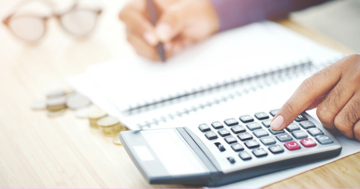 A person using a calculator.