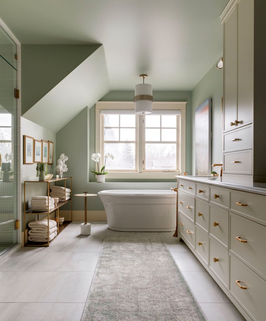 A newly renovated bathroom with modern accents in an older home.