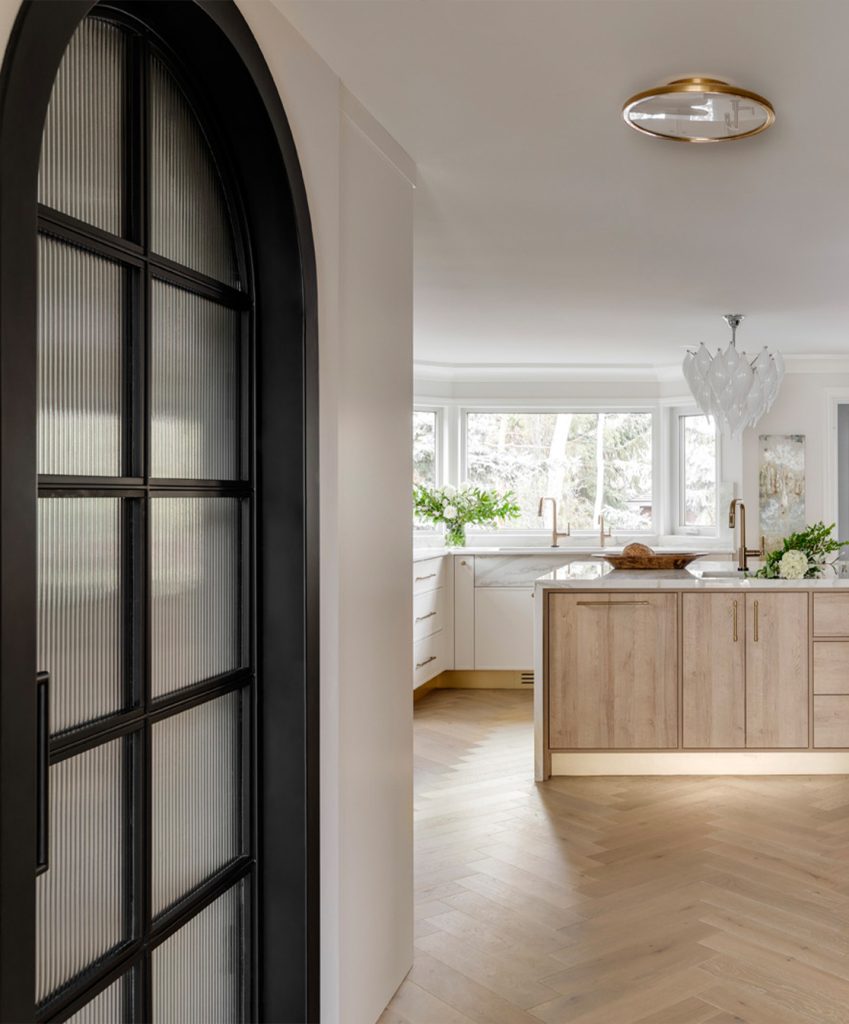Arched black pantry door
